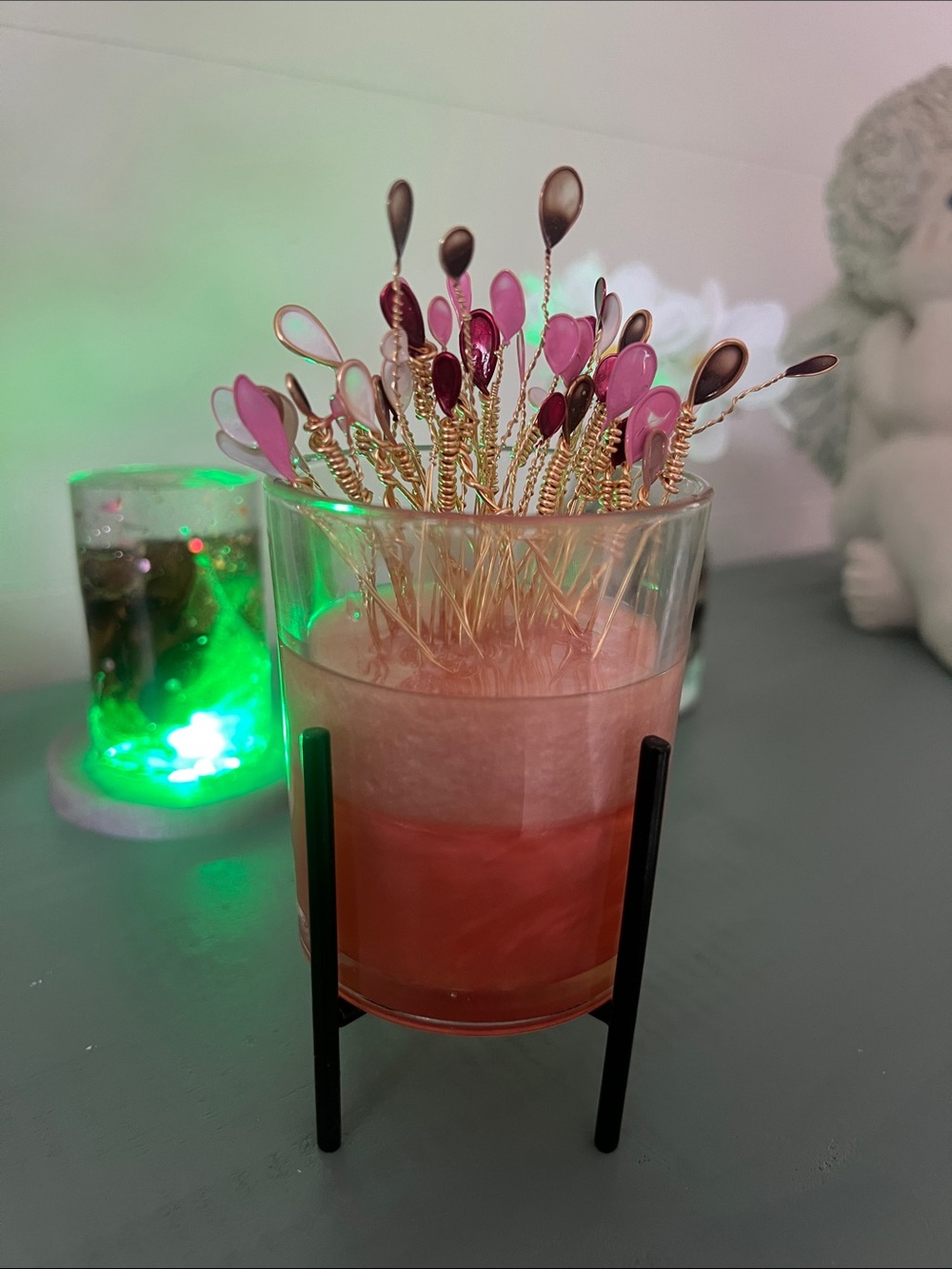 Pink and Gold Decorative Wire Picks in Glass Vase